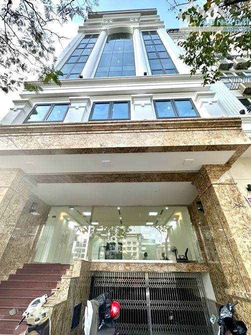 Building Khương Đình, sát phố, ô tô tránh đỗ, MT 10m, KD, 123m*7T thang máy, DT 1.5 tỷ/năm