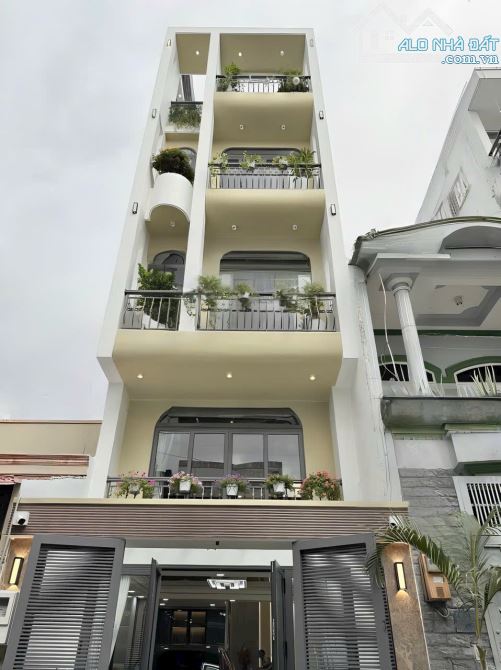 Nhà đẹp Gò Vấp-Hẻm ô tô 6M-Gần CV Làng Hoa-Lê Văn Thọ-P14-56m2-4x14-5tầng Thang Máy-4PN