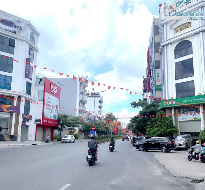 BÁN TÒA NHÀ VĂN PHÒNG GÓC HAI MẶT TIỀN ĐUONG SỐ 9 TTHC DĨ AN ĐANG CHO THUÊ 40TR/TH - 2
