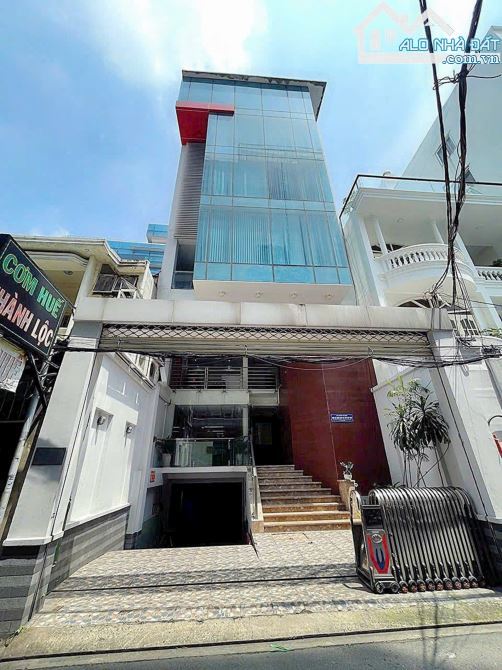 Ngộp Bank Bán Tòa Nhà Trần Hưng Đạo. DT: 12*23m. Hầm + 6 Tầng. Giá 59 tỷ TL
