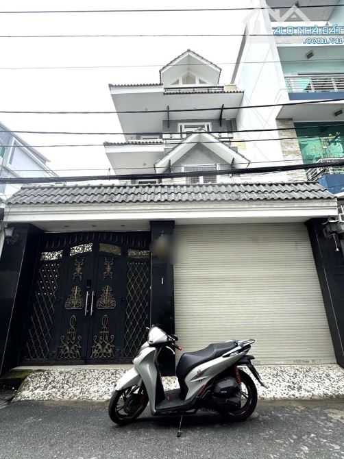 Bán nhà Tân Bình - mặt tiền - 170m2 - 4 tầng - ngang 7.3m