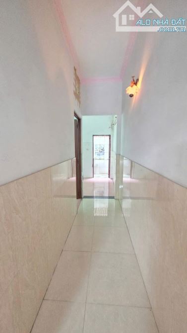 Nhà cấp 4 gác lửng mặt tiền Cao Bá Quát kế bên trường cấp 1.2.3 Dĩ An - 1