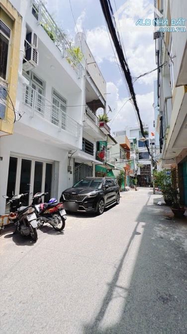 BÁN NHÀ KHU VIP ĐƯỜNG SỐ QUẬN 4 XE HƠI ĐỖ CỬA 3 TẤM DT 4*8 GIÁ 8 TỈ TL VỊ TRÍ XỊN - 1