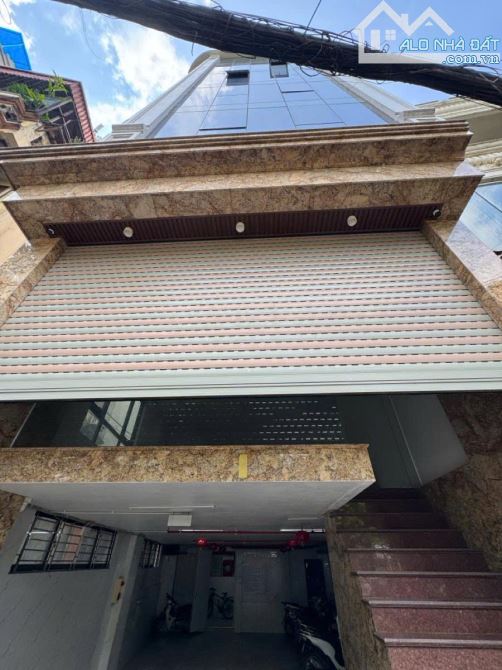 BÁN TÒA NHÀ VĂN PHÒNG 8 TẦNG  LÔ GÓC 125m MT 6.5m Ô TÔ TRÁNH HOÀNG QUỐC VIỆT GIÁ 70 TỶ - 1
