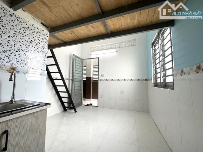 Bán CHDV 22 phòng phía sau Trường Đại Học Nguyễn Tất Thành, giá 12.3 tỷ tl - 2