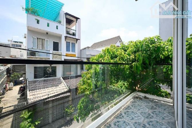Nhà 4x16m xây 4 tầng, mặt tiền Tân Chánh Hiệp, Q12, kề Đại học GTVT - 2