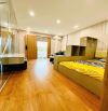 NHÀ TẬP THỂ ĐẸP - MẶT PHỐ QUỲNH MAI- FULL NỘI THẤT - 2 MẶT THOÁNG - Ô TÔ ĐỖ CẦU THANG