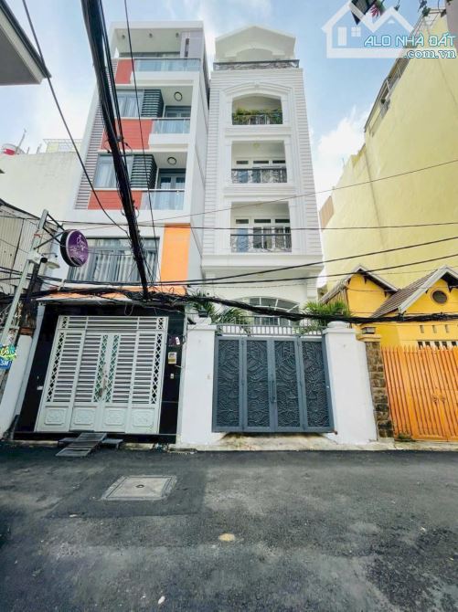 bán nhà MT đường hoa hồng DT 5x22 NH CN 132.4m 7 tầng thang máy HĐT 126tr/th giá chỉ 26 tỷ