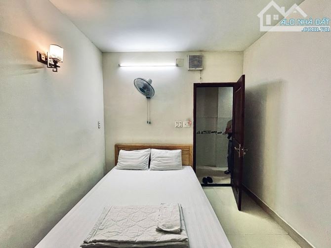 Khách Sạn 6tầng THANG MÁY đường LÊ VĂN KHƯƠNG phườngHT Q12 dt 125m2 Hẻm 7m THUNHẬP 80TR/TH - 10