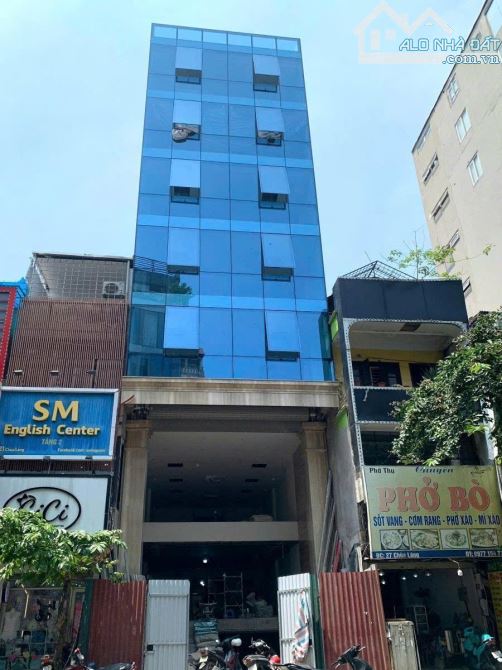 Tòa nhà văn phòng mặt phố Chùa Láng, 9 tầng thang máy, 162m2, mặt tiền 7m, 115 tỷ - 1