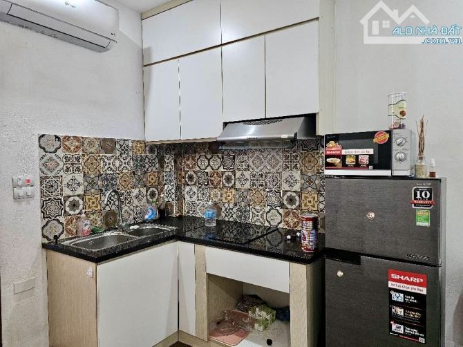 Bán nhà Nguyễn Văn Cừ 5 tầng, oto vào, gần phố, kinh doanh dòng tiền giá hơn 8 tỷ - 1