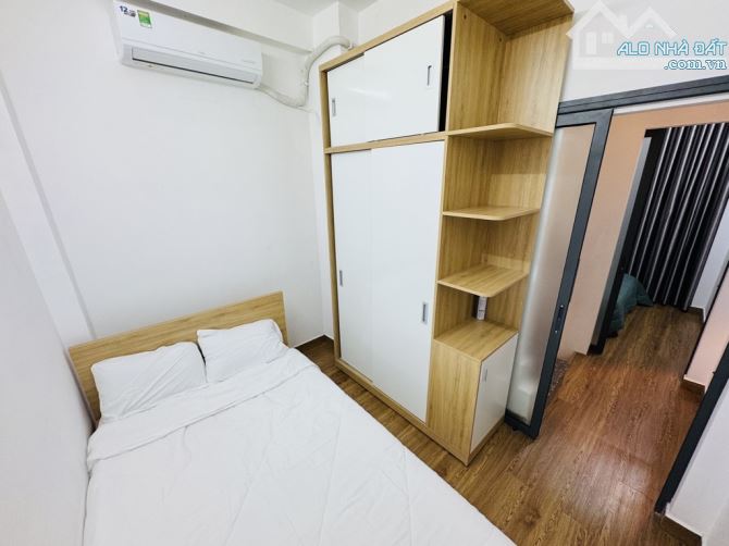 Bán nhà hẻm 5m Thích Quảng Đức PN, 4 tầng, full nội thất xịn sò, sổ vuông A4, chỉ 4.x tỷ - 3