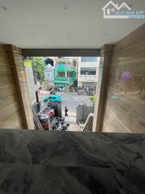Tòa nhà văn phòng mặt phố Chùa Láng, 9 tầng thang máy, 162m2, mặt tiền 7m, 115 tỷ - 3
