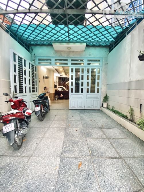 Khách Sạn 6tầng THANG MÁY đường LÊ VĂN KHƯƠNG phườngHT Q12 dt 125m2 Hẻm 7m THUNHẬP 80TR/TH - 7