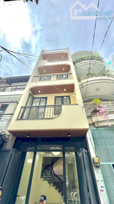 Nhà Mới 100% - Hẻm Xe Tải - Ni Sư Huỳnh Liên - DT 50m2 - 4 tầng - giá 9.6 tỷ TL