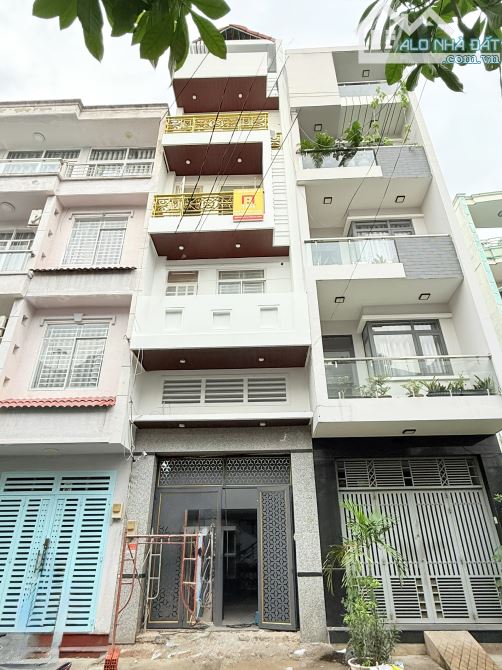 TOÀ CHDV 20 PHÒNG - NGAY ĐH VĂN LANG - HẺM XE TẢI TRÁNH - 100m2 - 6 TẦNG