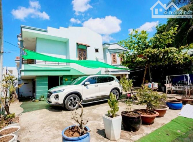 BÁN NHÀ GẦN KINH DƯƠNG VƯƠNG - 2 TẦNG 400M2 - NGANG TO 20M - HẺM XE HƠI - CHỈ 21.X TỶ