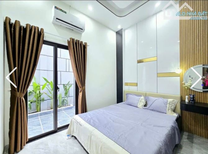 Nhà 2 tầng  oto 5m Tôn Đản , nhà mới đẹp full nội thất. DT:98m . Giá : 4tỷ450 TL - 2