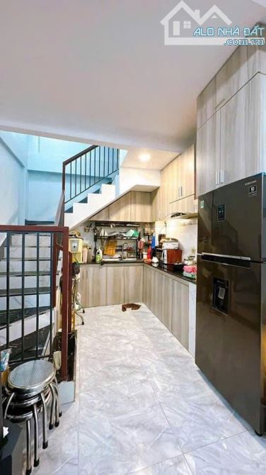 BÁN NHÀ KHU VIP 4 TẤM ĐƯỜNG SỐ XE HƠI ĐỖ CỬA ĐỒNG BỘ CAO TẦNG GIÁ 5 TỈ 7 TL GIÁP Q1 - 2