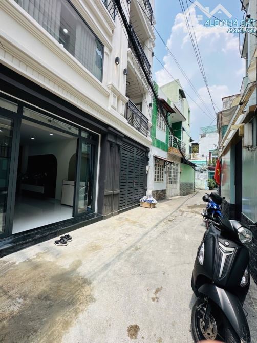 Bán NR hẻm xe hơi QUANG TRUNG - ngay COOP MART; dtich 75m2 mặt tiền 4.2m đồng bộ dân trí