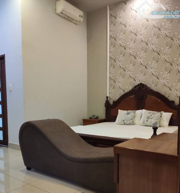 Bán KS Lê Văn Khương - MT Thới An 05. DT 12m x 25m , 1 trệt 4 lầu cho thuê khoán 75tr - 1