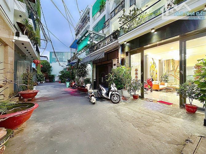nhà mới, hẻm xe hơi, trệt 2lầu sân thượng.Quang Trung, GV.DT: 4,5 x13m=9.3tỷ. - 2