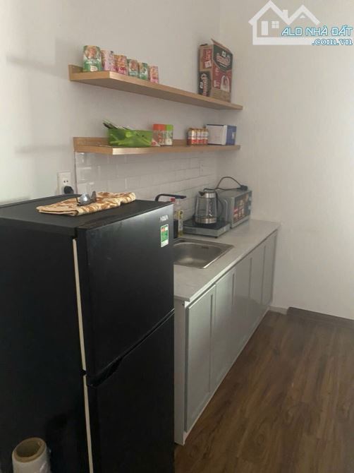 Bán toà căn hộ 4 tầng đường 5m5 Hoà Cường. Dt 67m2 8 phòng dthu 32tr ổn định - 4