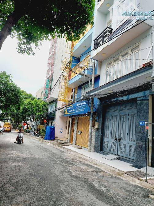 Tòa nhà căn hộ dịch vụ 6,5x20m Văn Chung, P.13, Tân Bình,4 tầng giá 20,99 tỷ