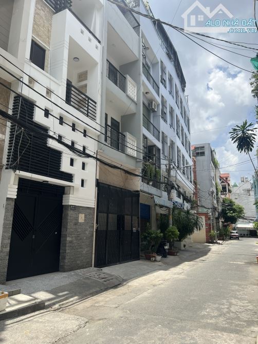 bán nhà hẻm 8m Nguyễn Hồng Đào, p14 ,Quận Tân Bình .DT:4x16m .5 tầng .9p .Gía :12.5 tỷ - 4