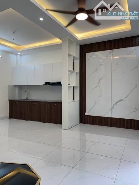 BÁN NHÀ ĐÀM QUANG TRUNG,5 TẦNG ,55m.11 x..tỷ