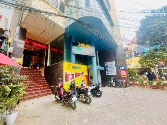 BÁN TOÀ VĂN PHÒNG 9 TẦNG LÔ GÓC PHỐ TRẦN THÁI TÔNG-DT 121M2 MT 11.3M-GIÁ 68.8 TỶ - 1