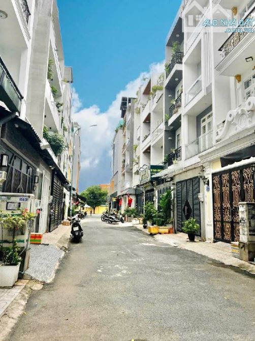 NHÀ NGAY ĐẦM SEN KHU PHÂN LÔ VIP TÔ HIỆU HẺM XE HƠI 7M 60M²(4×15)4 TẦNG,5PN,KO LỘ GIỚI - 2