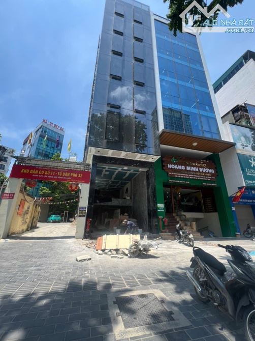 CẦN BÁN GẤP TOÀ NHÀ VP-  9 TẦNG - LÔ GÓC -VỊ TRÍ ĐẮC ĐỊA - NẰM TRÊN PHỐ - KHUẤT DUY TIẾN. - 2