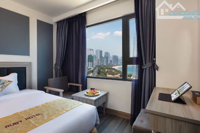 Bán khách sạn mặt tiền đường Trần Phú  -  Diện tích đất: 212 m2,ngang 9 mét , 20 tầng - 6