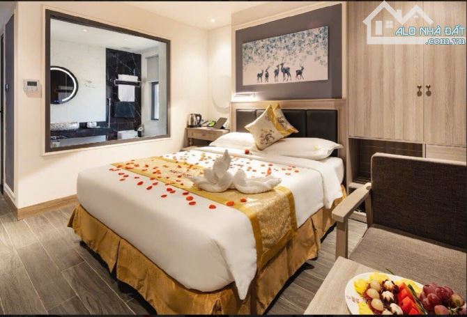 Bán khách sạn mặt tiền đường Trần Phú  -  Diện tích đất: 212 m2,ngang 9 mét , 20 tầng - 8