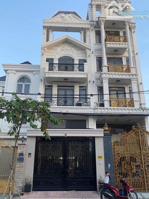 Bán nhà 319/47 Lê Văn Thọ Gò Vấp 4 lầu thang máy dt 4x18 giá 14 tỷ