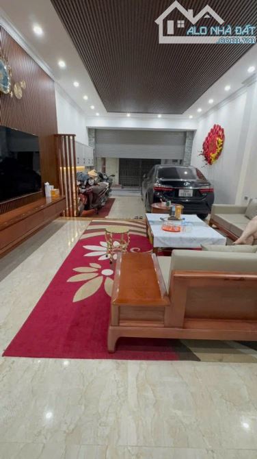 Bán nhà láng hạ thang máy kinh doanh oto đỗ cửa dt 69 7 tầng