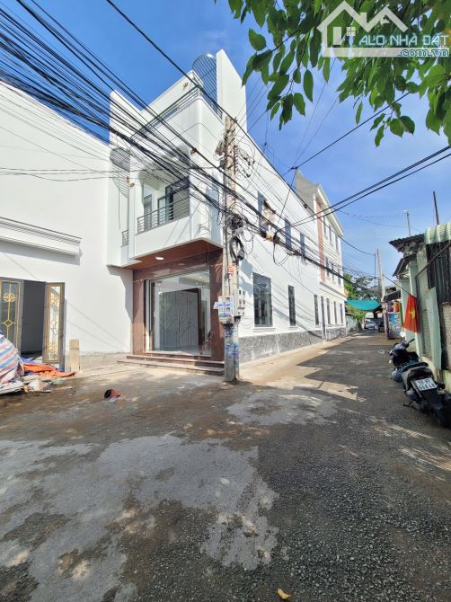 nhà 1 trệt 1 lầu 61,2m2 3ty5 TL góc 2MT cách đường Hoàng Minh Chánh 100m p.Hóa An - 1