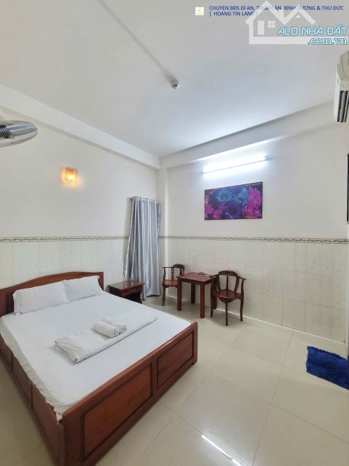 nhà nghỉ 1 trệt 5 lầu 100m2 thu nhập 100tr/thg MT đường GS3 p.Đông Hòa Tp.Dĩ An - 1