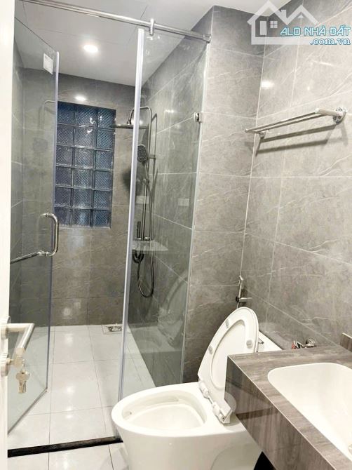 Bán nhà mặt phố Tây Sơn Đống Đa 52m 5T thang máy Kinh doanh vỉa hè 23 tỷ - 5
