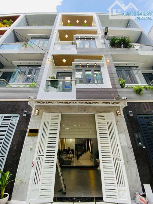 Nhà HXH Đào Tông Nguyên, Nhà Bè. DT 50m2. 4 tầng. 4m x 12.5m. Giá 6.39 tỷ.