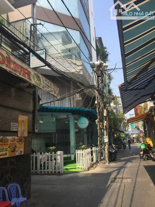 Bán Nhà Góc 3 MT Đường Nguyễn Cảnh Chân Quận 1. KC:5 Tầng+Thang máy.Giá 12,5 Tỷ