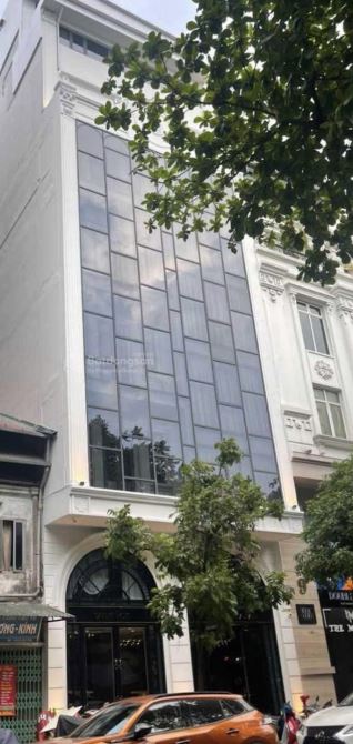 Bán Toà Nhà Lô Góc Mặt Phố Trần Vỹ Cầu Giấy DT 120m2 10T MT 7.8M Kinh Doanh Đỉnh Giá 90Tỷ.