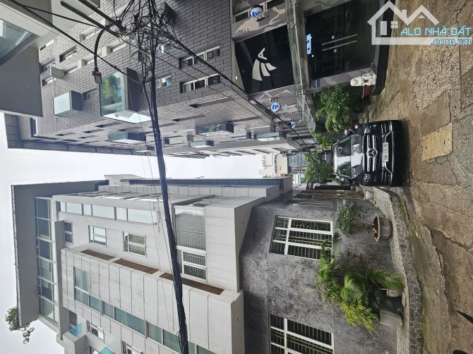 Bán nhà Láng Hạ 8 tầng khu văn phòng Lô góc ô tô tránh vòng quanh vỉa hè, 105m giá hơn 50