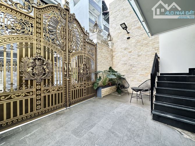 BÁN NHÀ PHÚ NHUẬN - 100M2 - 7 TẦNG - HẺM 8M - Ô TÔ - TRUNG TÂM - 13