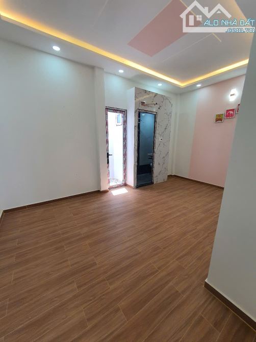 Nhà mới ngang 5m 2 tầng đường Lưu Hữu Phước q8 - 8