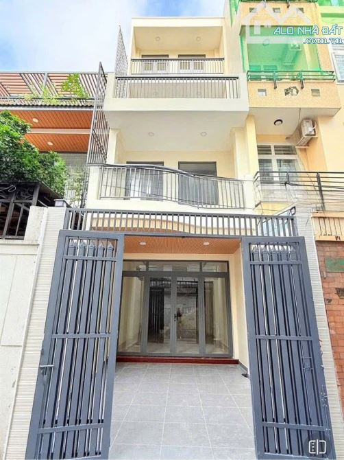 Hẻm xe hơi 5m thông . 4 tầng . 72m2 (4×18) 6pn. 7wc. Sổ hoàn công đủ .