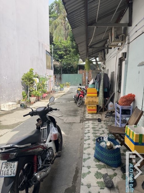 Dãy trọ đường NGUYỄN VĂN QUÁ phường ĐHT Q12 dt 114m2 (5mx21m) Hẻm 5m DÒNG TIỀN 15TR/TH - 2