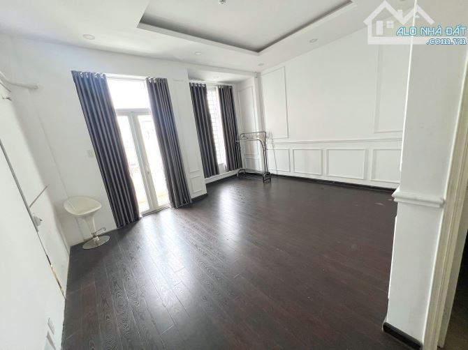 Nhà MT Nguyễn Đình Chính 5,5x18m Hầm.Trệt. 4L,7P,7wc, có ML.Tốt VP.Spa - 4