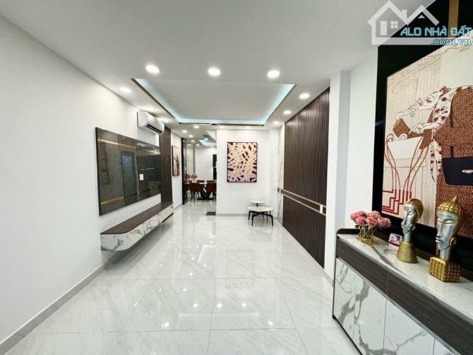NHÀ 4 TẦNG HẺM XE HƠI THÔNG NGUYỄN VĂN LINH - TÂN THUẬN NHỈNH 7ty TL - 4